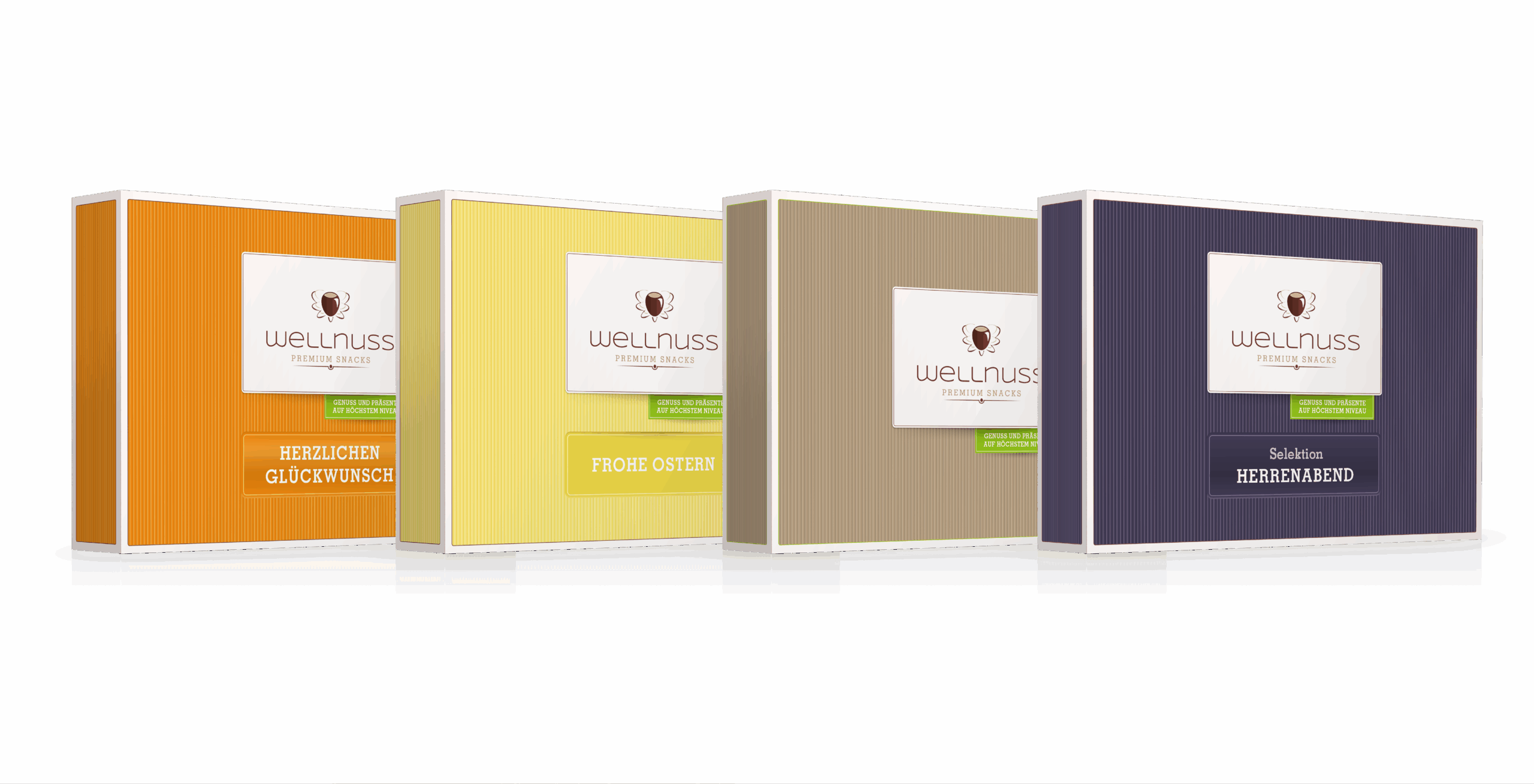 Wellnuss – Verpackungsdesign Geschenkboxen Farbige Geschenkboxen von Wellnuss Premium Snacks mit verschiedenen Editionen wie „Herzlichen Glückwunsch“, „Frohe Ostern“ und „Herrenabend“.